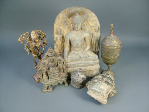 Appraisal: An Indian carved schist figure of the seated Buddha with