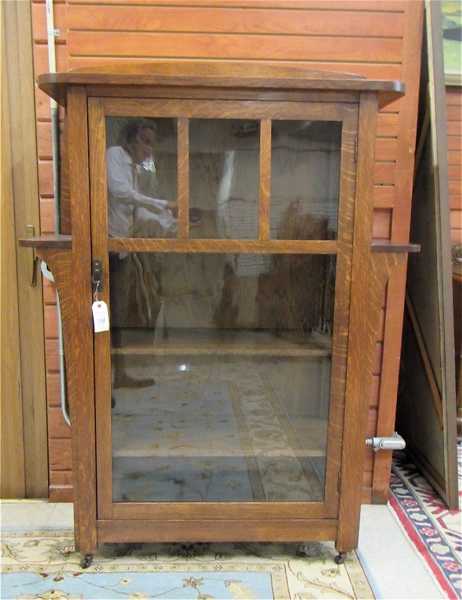 Appraisal: LIMBERT SINGLE-DOOR OAK CHINA CABINET Charles P Limbert Co Grand