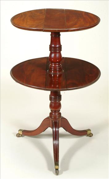 Appraisal: A Regency mahogany circular two-tier dumb waiter circa with hinged