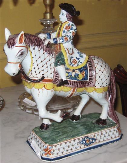 Appraisal: French faience polychromed equestrian figureMarked with red 'R'