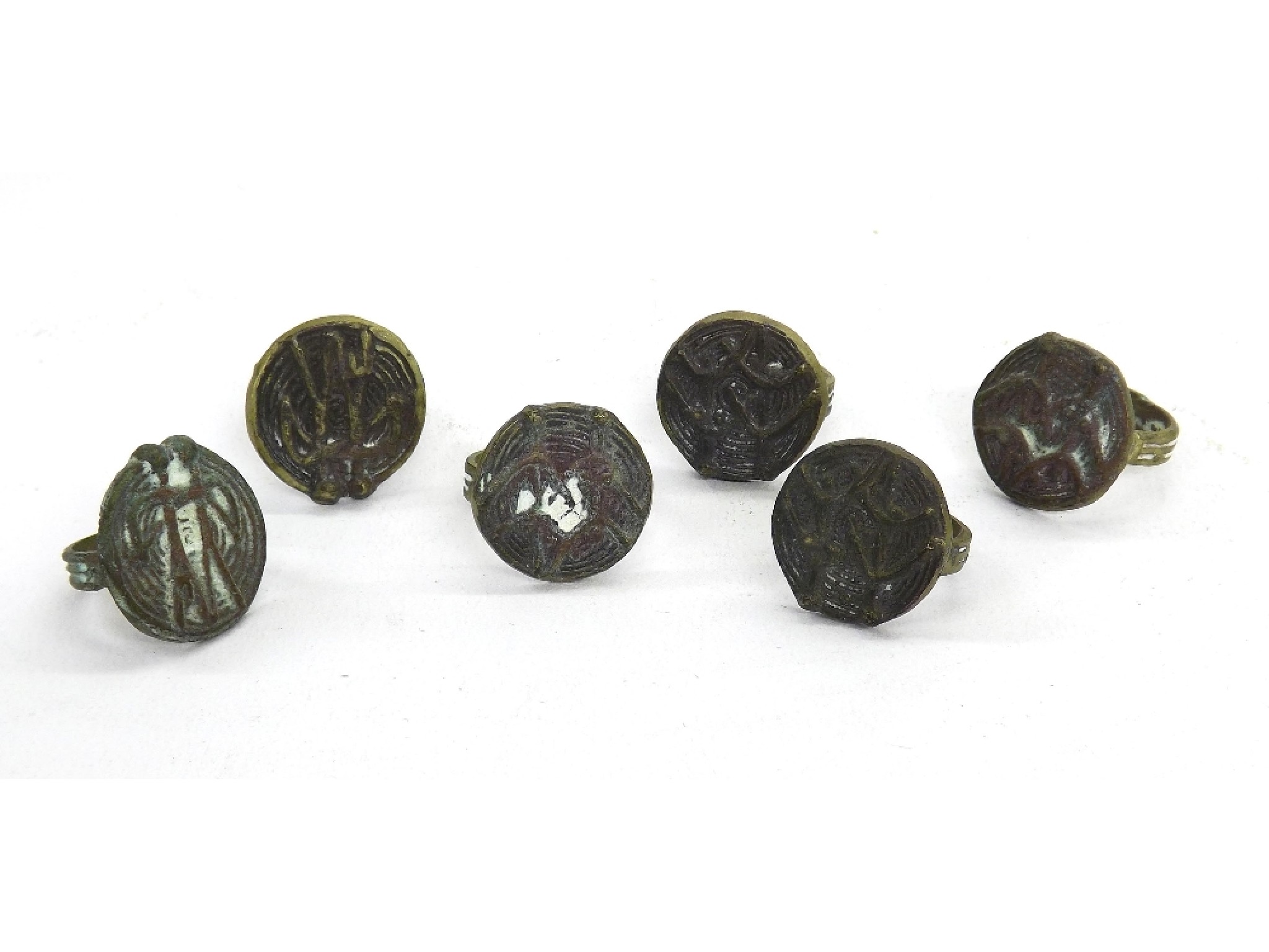 Appraisal: Six various undated rings of Eastern origin cast with figures