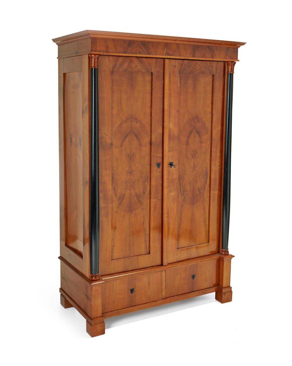 Appraisal: A contemporary Biedermeier-style armoire th Century The cabinet with two