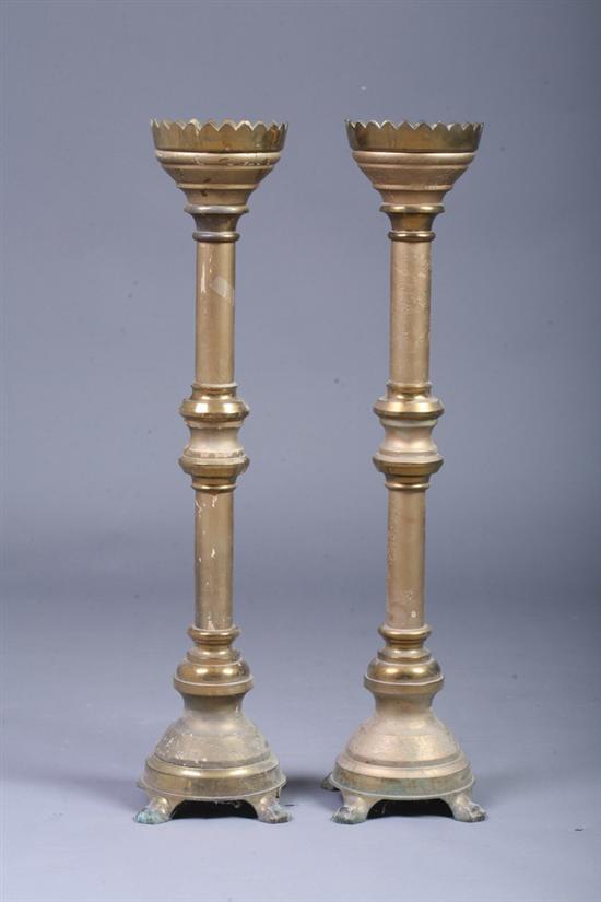 Appraisal: PAIR GILT-METAL AND PAINTED WOOD ALTAR STICKS th century Stepped