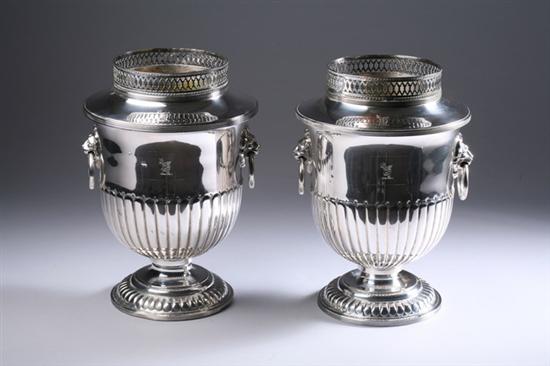 Appraisal: PAIR SHEFFIELD PLATE WINE COOLERS th century Gadrooned waist and