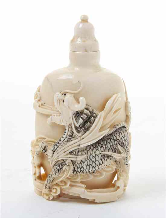 Appraisal: A Carved Ivory Snuff Bottle decorated with a writhing dragon