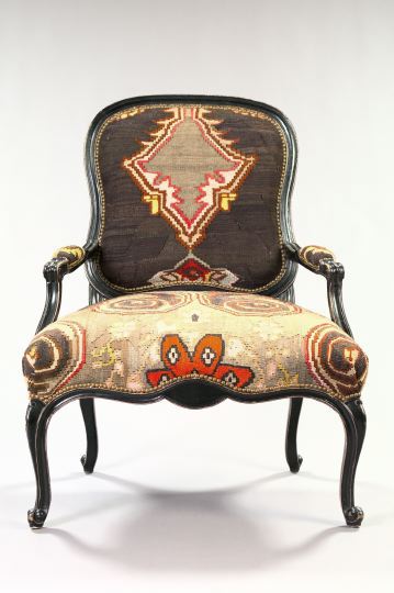 Appraisal: Large Louis XV-Style Ebonized Fauteuil raised on cabriole-form legs and