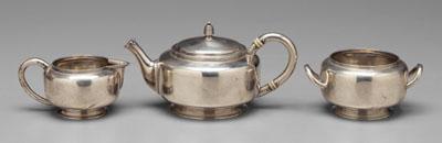 Appraisal: Three-piece sterling tea service round with reeded borders honeycomb finials