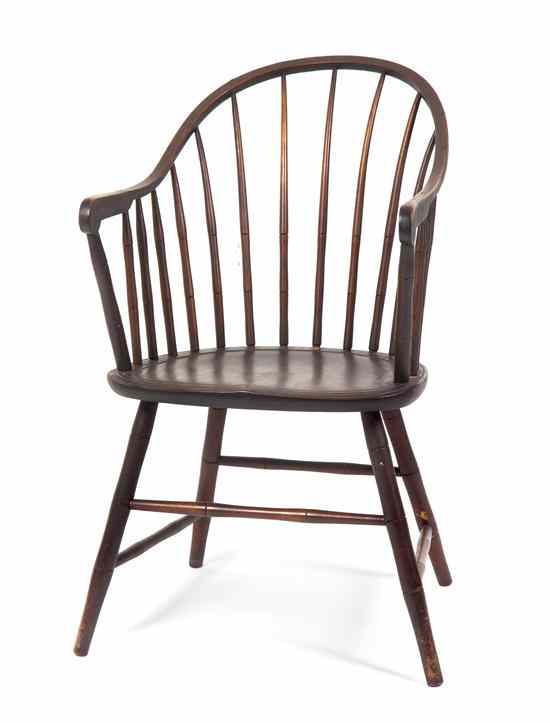 Appraisal: A Windsor Arm Chair having a yoke form crest rail