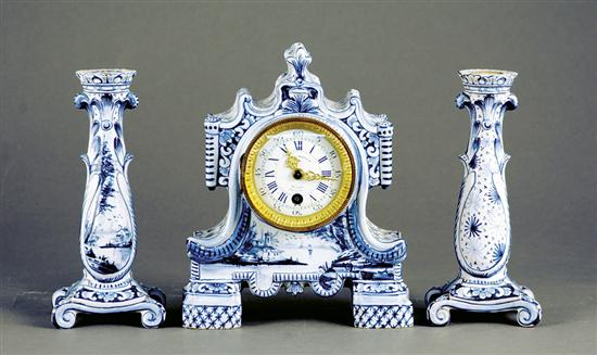 Appraisal: French Delft style three-piece clock garniture circa pagoda-shaped porcelain case