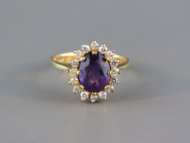 Appraisal: Amethyst Diamond Ring fine oval gem weighing carats surrounded by