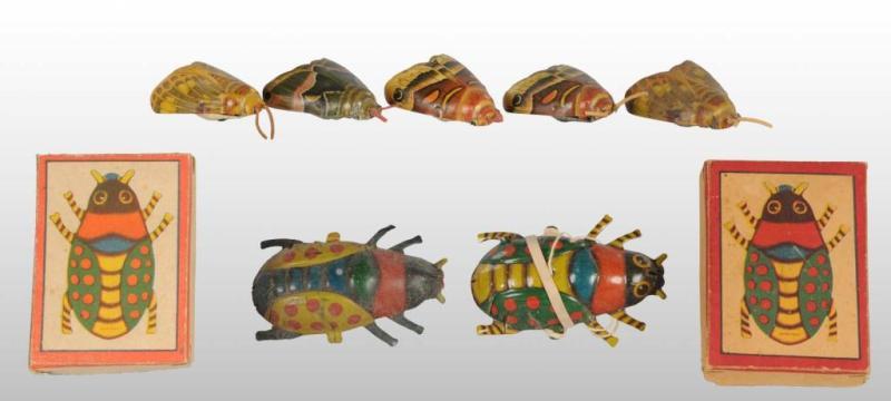 Appraisal: Lot of Moth Beetle Push Toys Description German and American