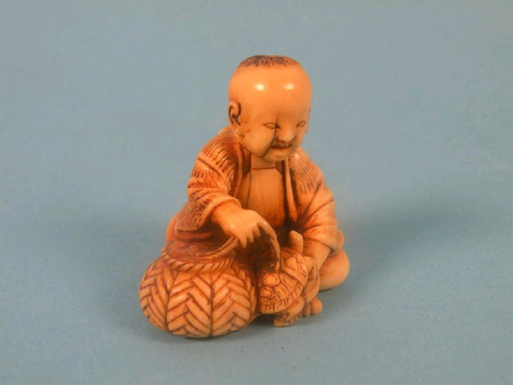 Appraisal: A late thC ivory netsuke carved in the form of