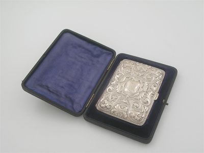 Appraisal: A late Victorian embossed card note case and wallet combined