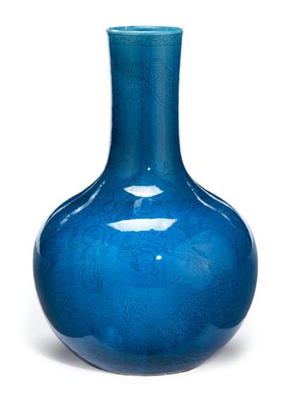 Appraisal: Good Chinese 'dragon' incised turquoise glazed bottle vase th century