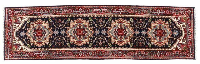 Appraisal: Hand-tied Persian Serapi runner approx ' l ' w