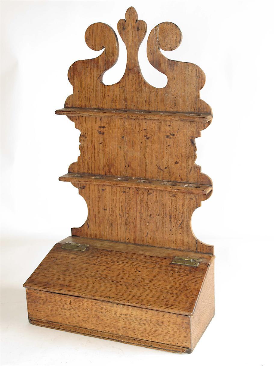 Appraisal: A George III oak spoon rack