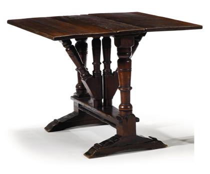 Appraisal: English oak gateleg table th century and later The narrow