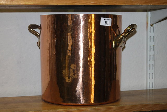 Appraisal: A COPPER AND BRASS TWO HANDLED CYLINDRICAL PAN cm high