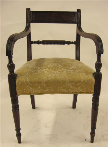 Appraisal: Regency mahogany armchair With a curved tablet backrest and rope