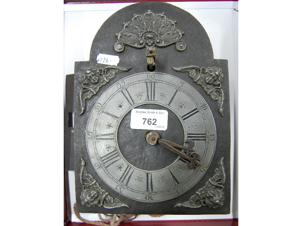 Appraisal: Continental tin-cased wall clock the arched dial with cast spandrels