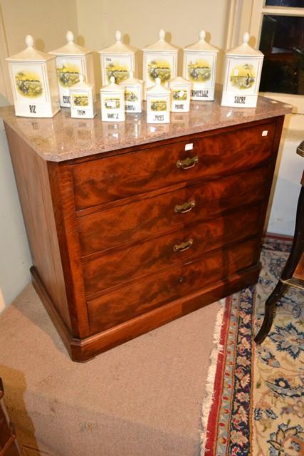 Appraisal: A FLAME MAHOGANY FOUR DRAWER CHEST WITH MARBLE TOP A