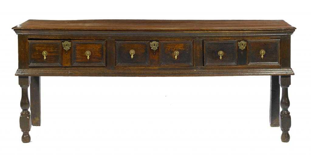 Appraisal: A WILLIAM III OAK DRESSER with moulded top and three