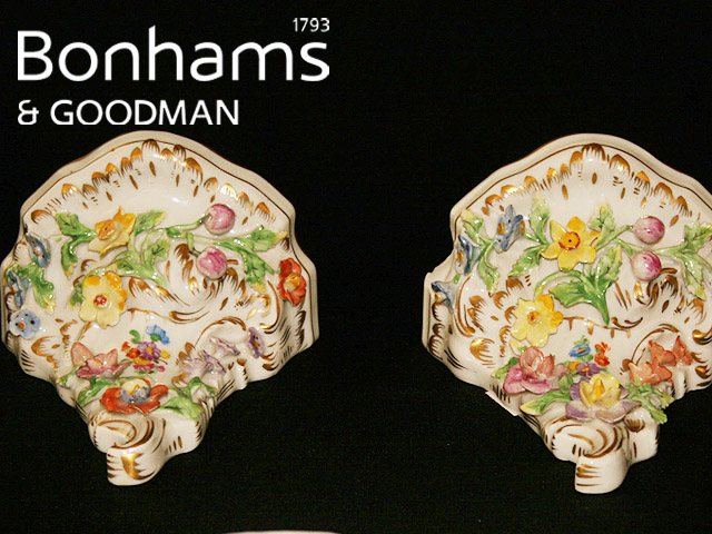 Appraisal: A pair of Dresden wall brackets with applied and painted