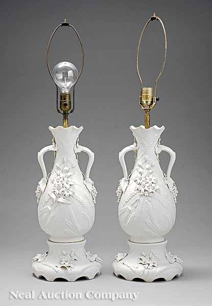 Appraisal: A Pair of Antique Parian Vases having applied handles terminating