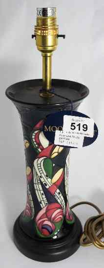 Appraisal: Moorcroft Lamp decorated in the La Famille design brand new