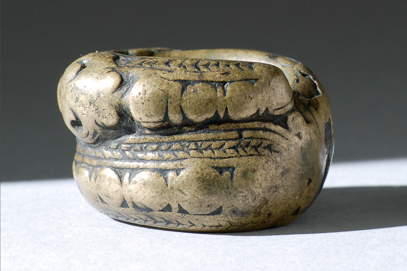 Appraisal: BRONZE RING Probably GurunsiIn a stylized snake design with herringbone