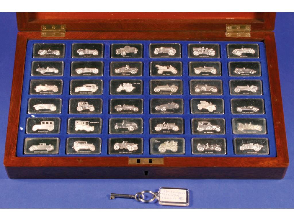 Appraisal: A CASED SET OF THIRTY SIX SILVER INGOTS commissioned by