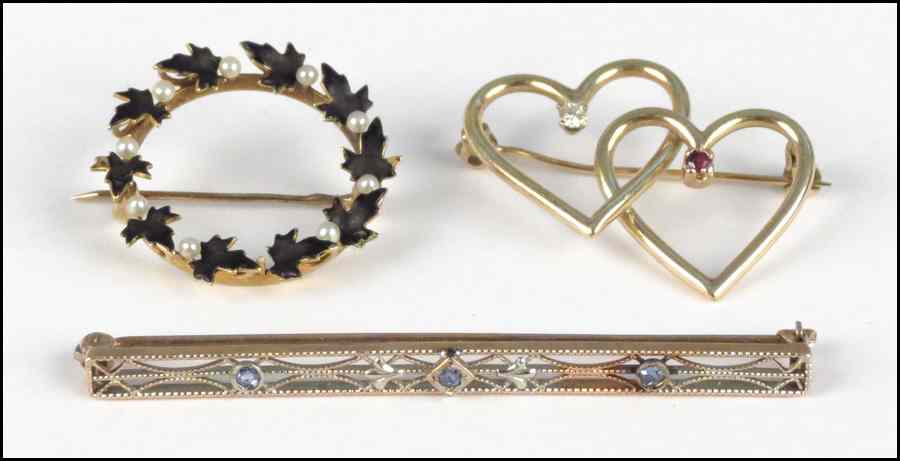 Appraisal: KARAT YELLOW GOLD DOUBLE HEART BROOCH Together with a karat