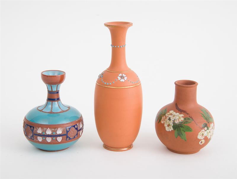 Appraisal: WATCOMBE TERRACOTTA CO TORQUAY Three decorated bud vases with mark