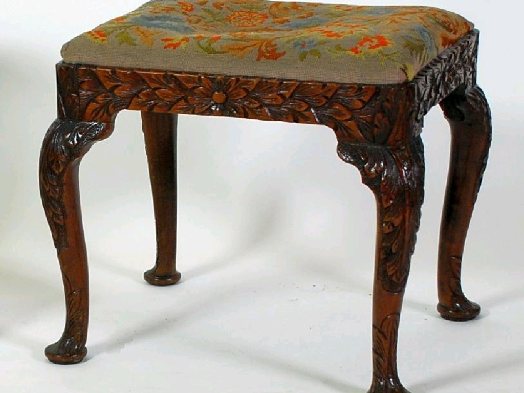 Appraisal: ANTIQUE CARVED MAHOGANY STOOL the oblong padded drop in seat