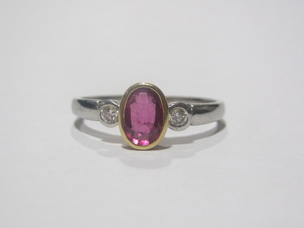 Appraisal: Platinum ruby and diamond three stone ring with oval cut