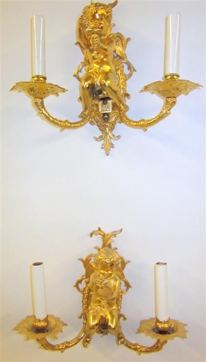 Appraisal: Pair Louis XV style gilt bronze wall sconcesEach cast as