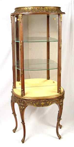 Appraisal: FRENCH GILT WOOD PERFUME CABINET Mirrored back glass shelves open