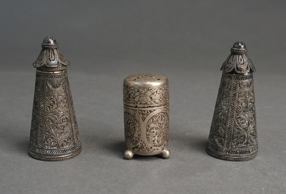 Appraisal: THREE EGYPTIAN TUGHRA MARKED SILVER SHAKERS INCLUDING DOUBLE-WALLED FILIGREE PAIR