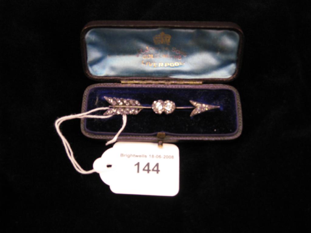 Appraisal: An Edwardian Diamond Bar Brooch of arrow through double heart