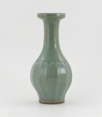 Appraisal: A Chinese Longquan celadon vase with a flared rim the