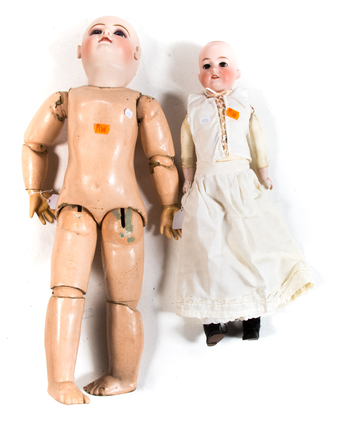 Appraisal: Two assorted dolls including Armand Marseille bisque head doll and