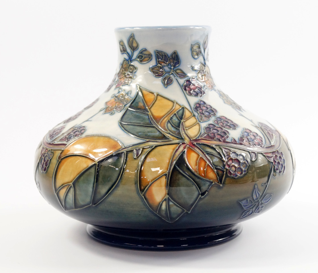 Appraisal: A Moorcroft pottery vase decorated in the Blackberries pattern of