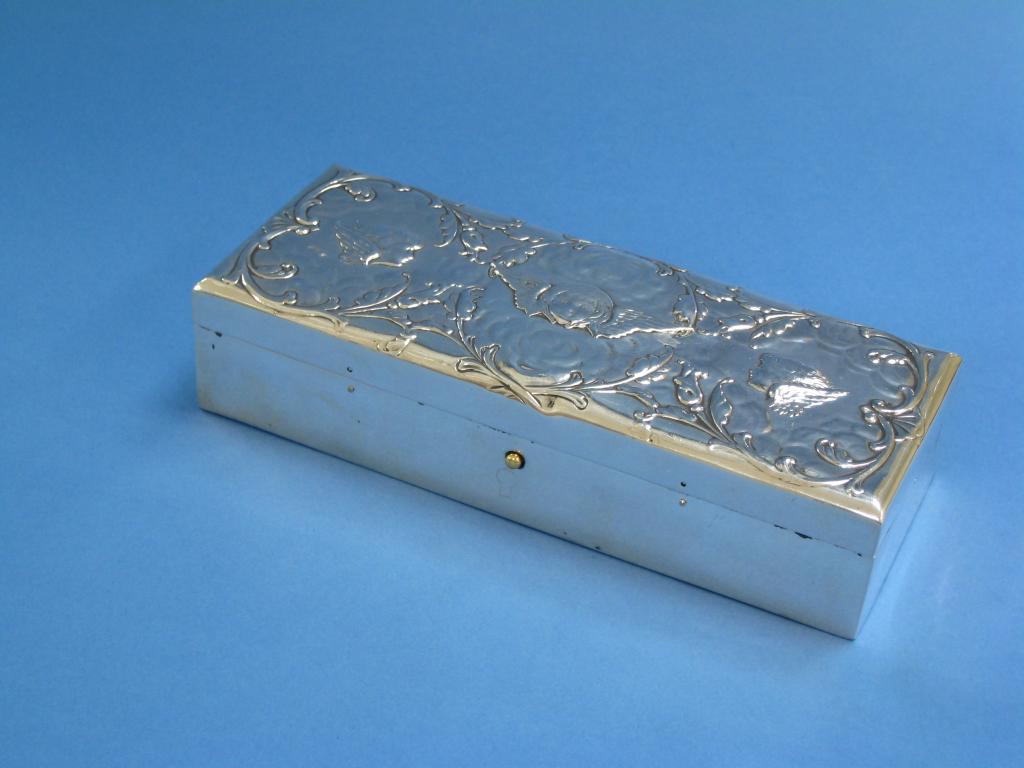 Appraisal: A Victorian rectangular Pen Box embossed cherub masks with blue