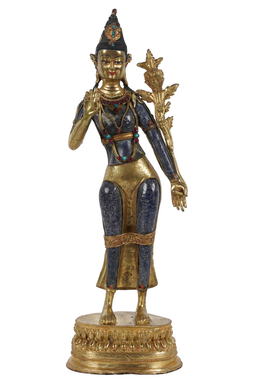 Appraisal: ASIAN GILT METAL-MOUNTED STONE FIGURE OF A DEITYinset with colored