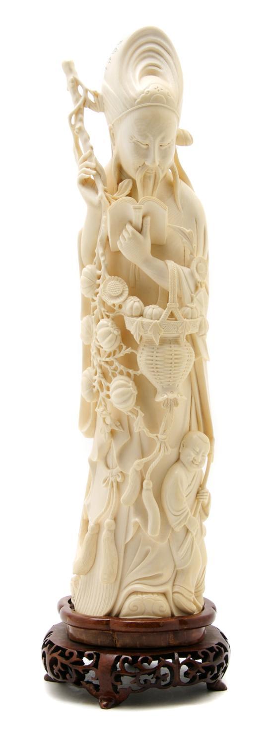 Appraisal: n Ivory Figure of a Sage the figure reading and