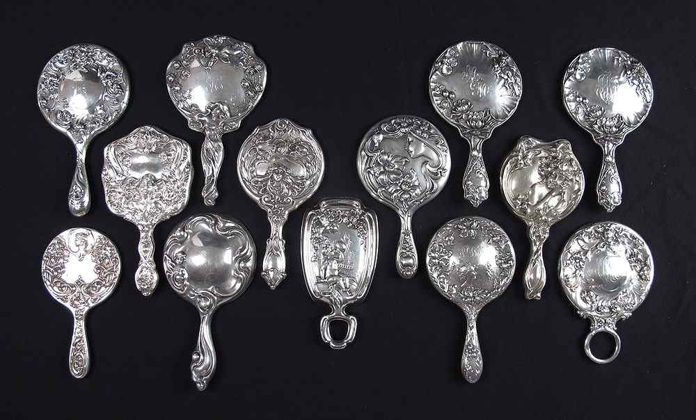 Appraisal: COLLECTION OF ART NOUVEAU STERLING MIRRORS All with figural and