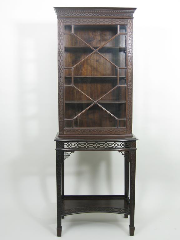 Appraisal: A Chippendale Revival Cabinet on stand having single astragal glazed