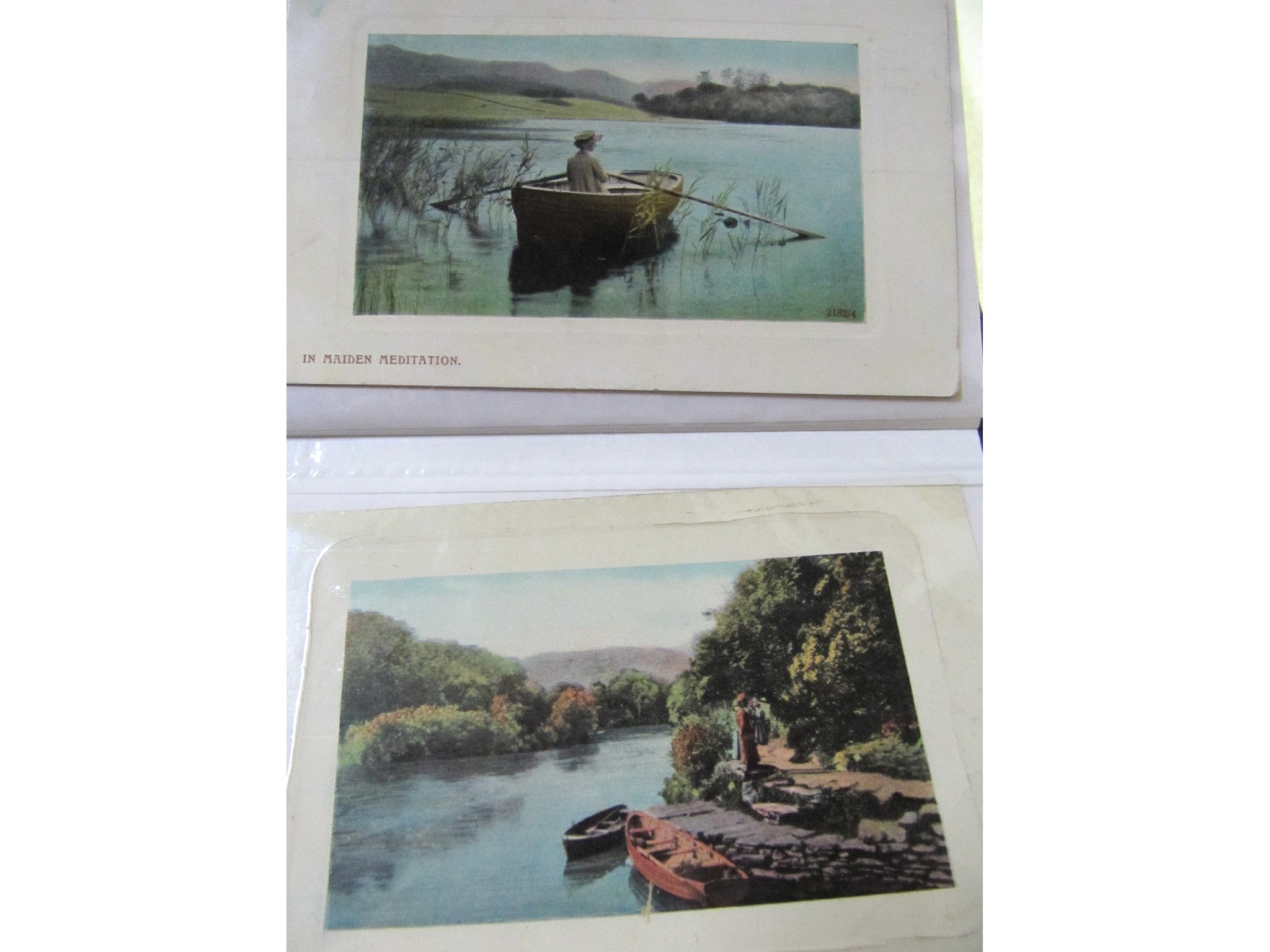 Appraisal: A lot comprising two albums of postcards