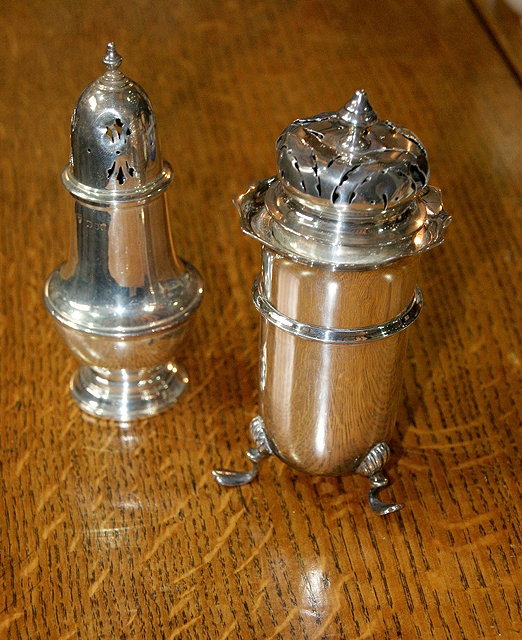 Appraisal: Silver casterof baluster form with urn shaped finial London together