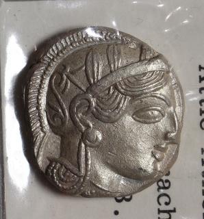 Appraisal: Goddess Athena in a Corinthian helmet owl standing on a